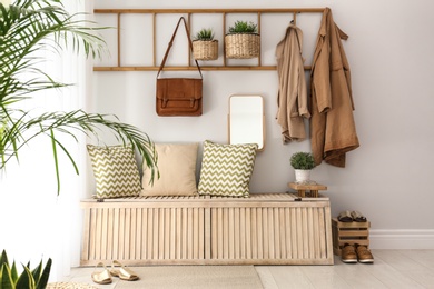 Cozy hallway interior with new stylish furniture