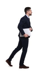 Handsome bearded businessman in suit with laptop on white background