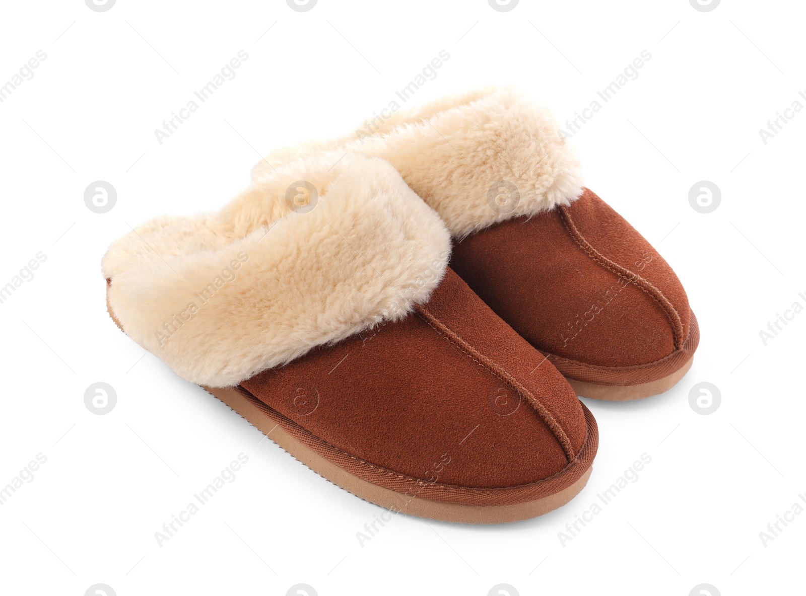 Photo of Pair of soft slippers with fur isolated on white