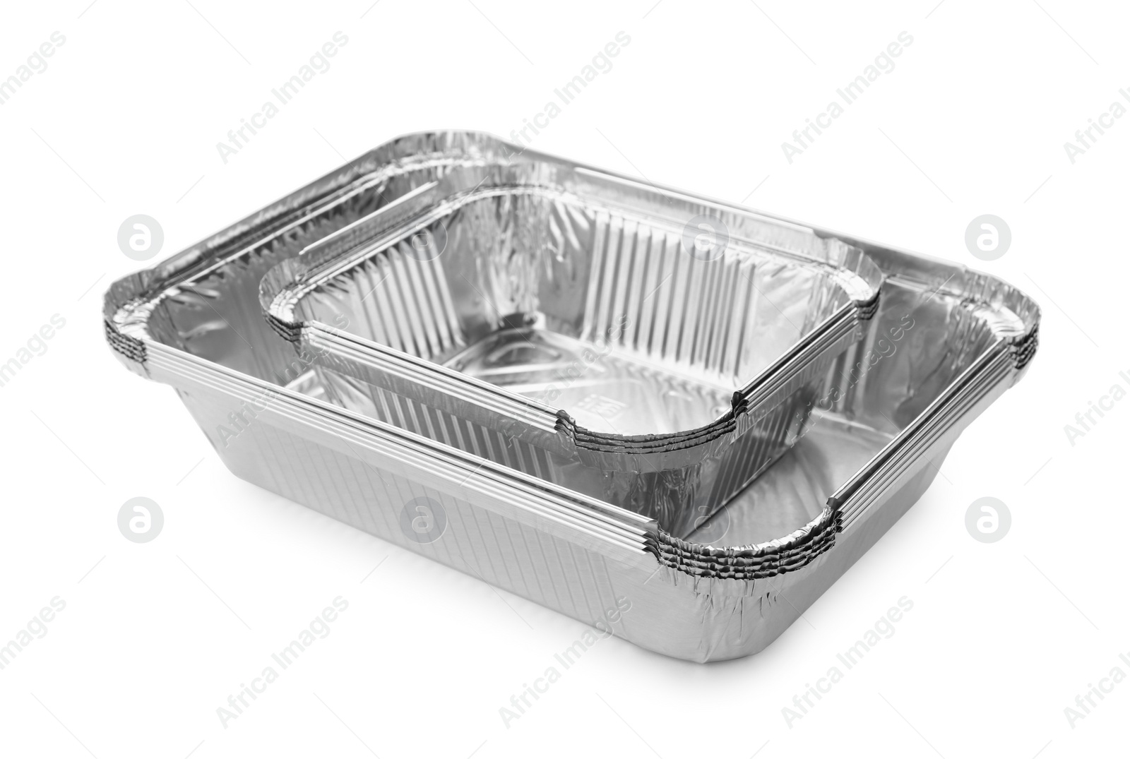 Photo of Many different aluminum foil containers isolated on white