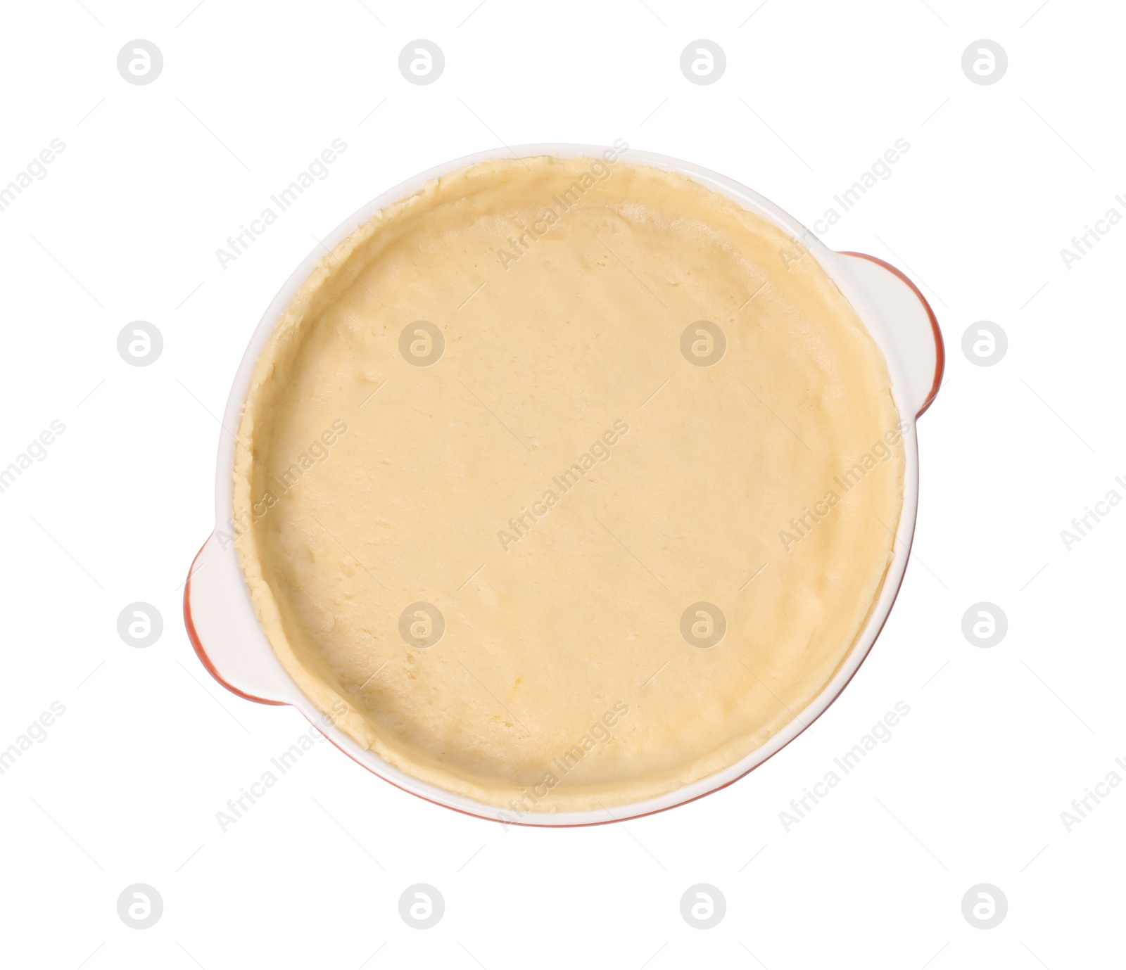 Photo of Pie tin with fresh dough isolated on white, top view. Making quiche