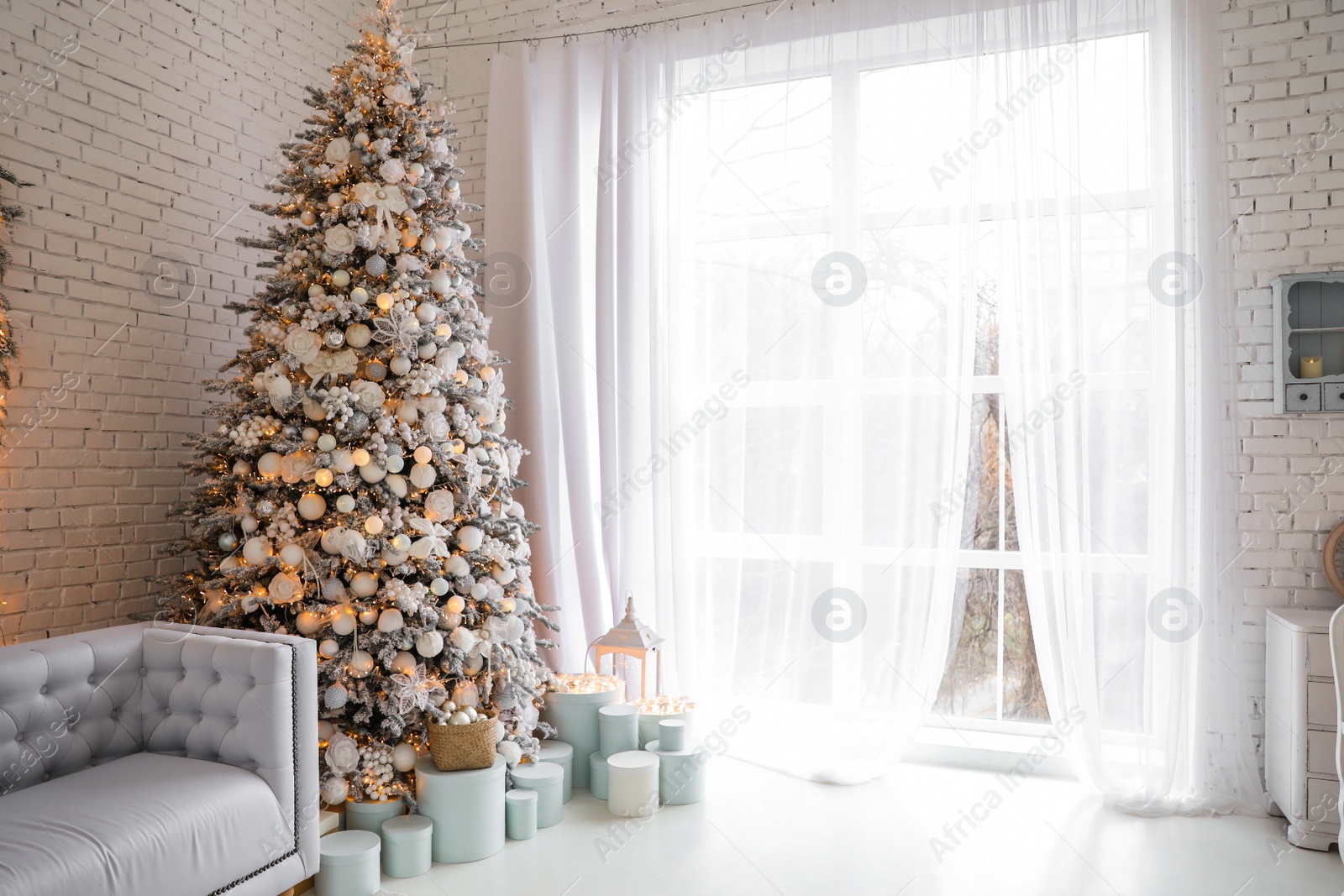 Photo of Beautiful interior of living room with decorated Christmas trees