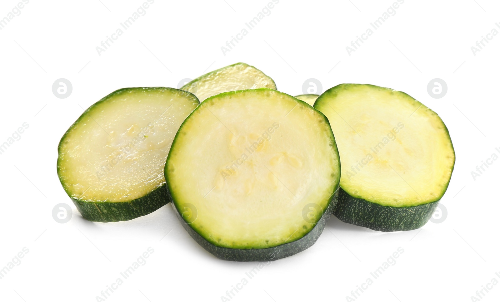 Photo of Slices of fresh ripe zucchini isolated on white