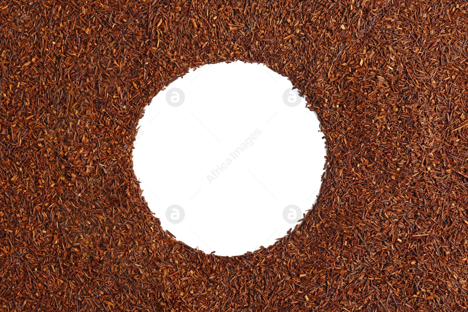 Photo of Frame made of dry rooibos tea leaves on white background, flat lay. Space for text