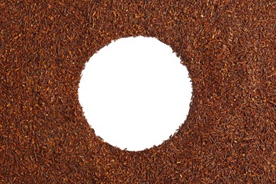 Photo of Frame made of dry rooibos tea leaves on white background, flat lay. Space for text
