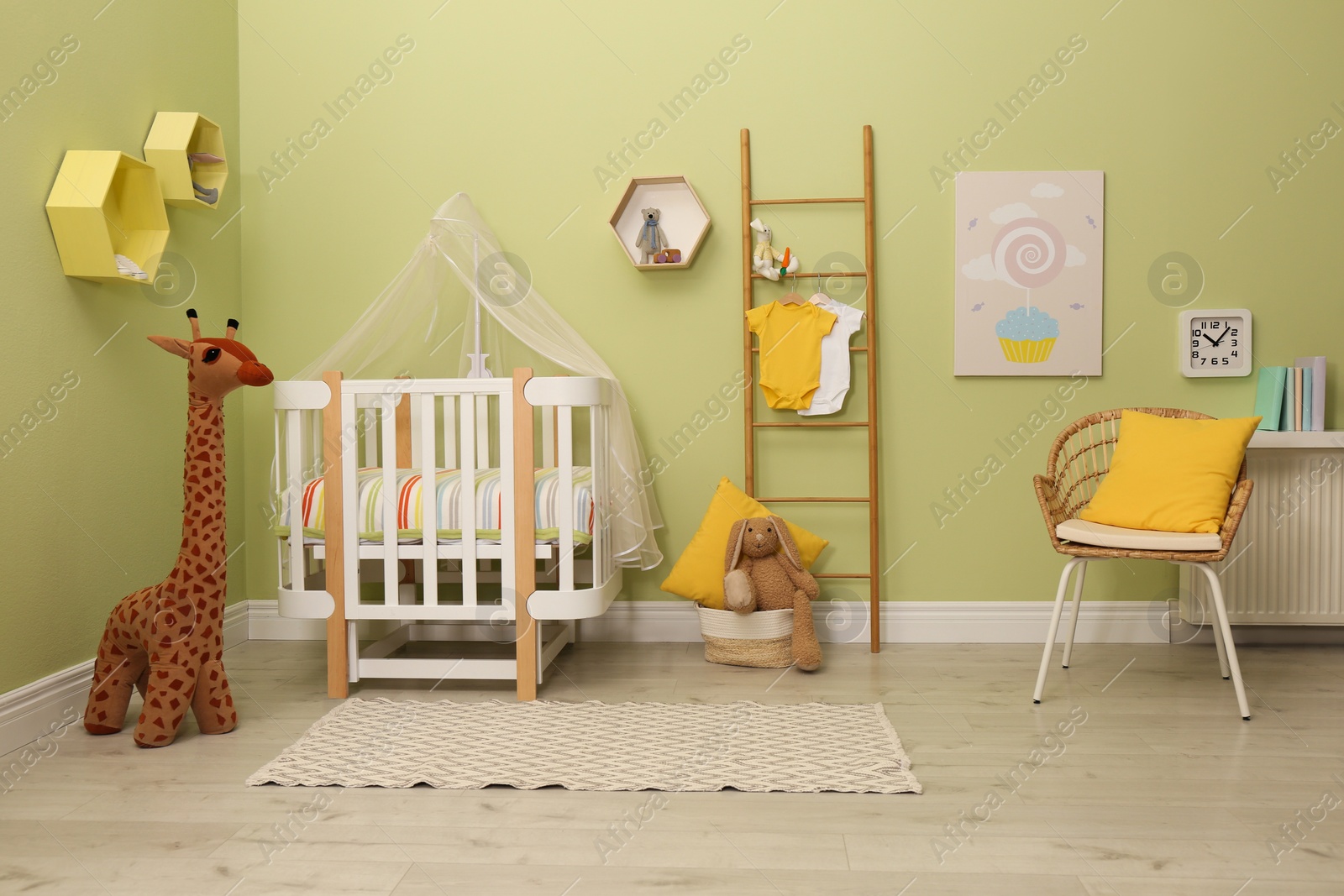 Photo of Baby room interior with stylish furniture and toys