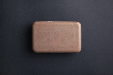 Soap bar on color background, top view. Personal hygiene