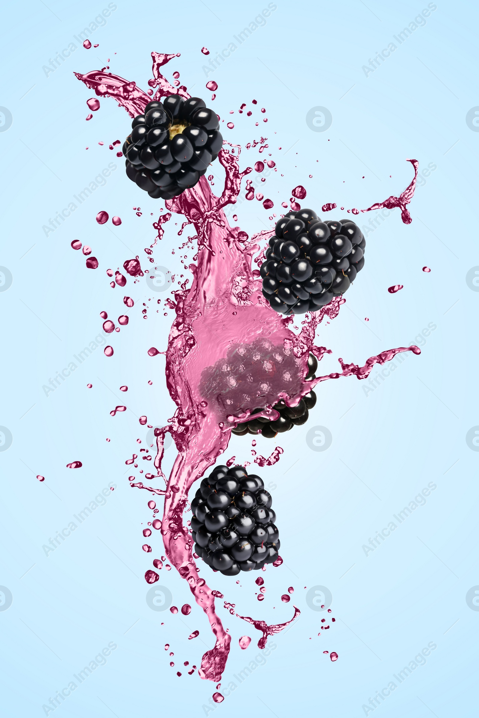 Image of Fresh blackberries and juice in air on light blue background