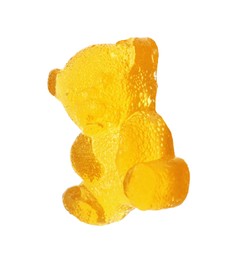 Photo of Delicious yellow gummy bear candy isolated on white