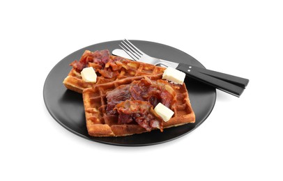 Photo of Plate with tasty Belgian waffles, bacon, butter and cutlery isolated on white