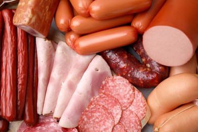 Different types of sausages on table, closeup