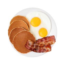 Photo of Tasty pancakes with fried eggs and bacon isolated on white, top view