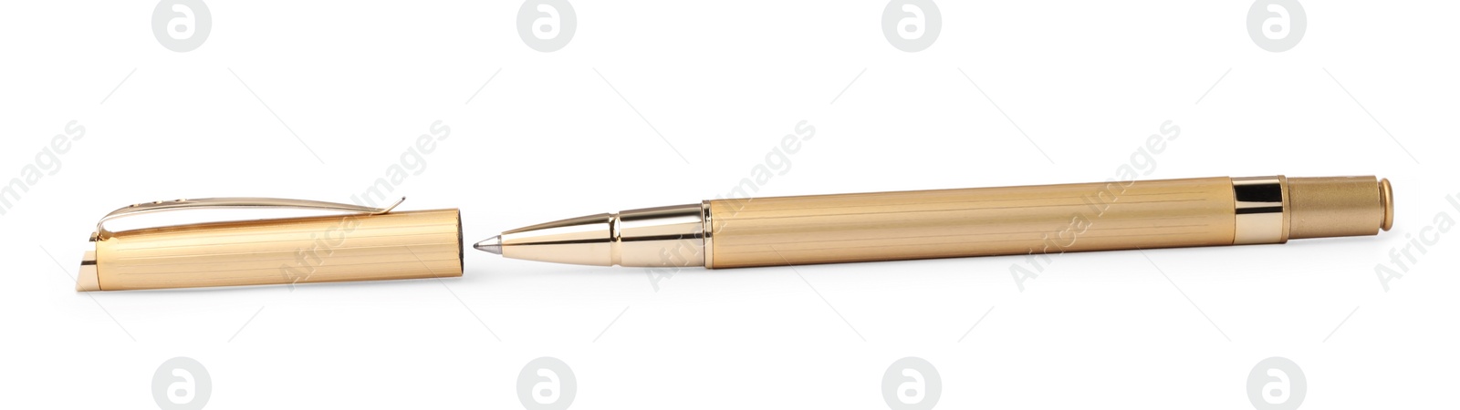 Photo of New stylish golden pen isolated on white