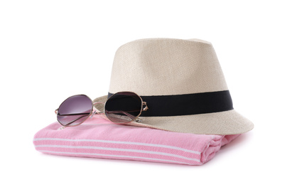 Towel, sunglasses and hat on white background. Beach objects