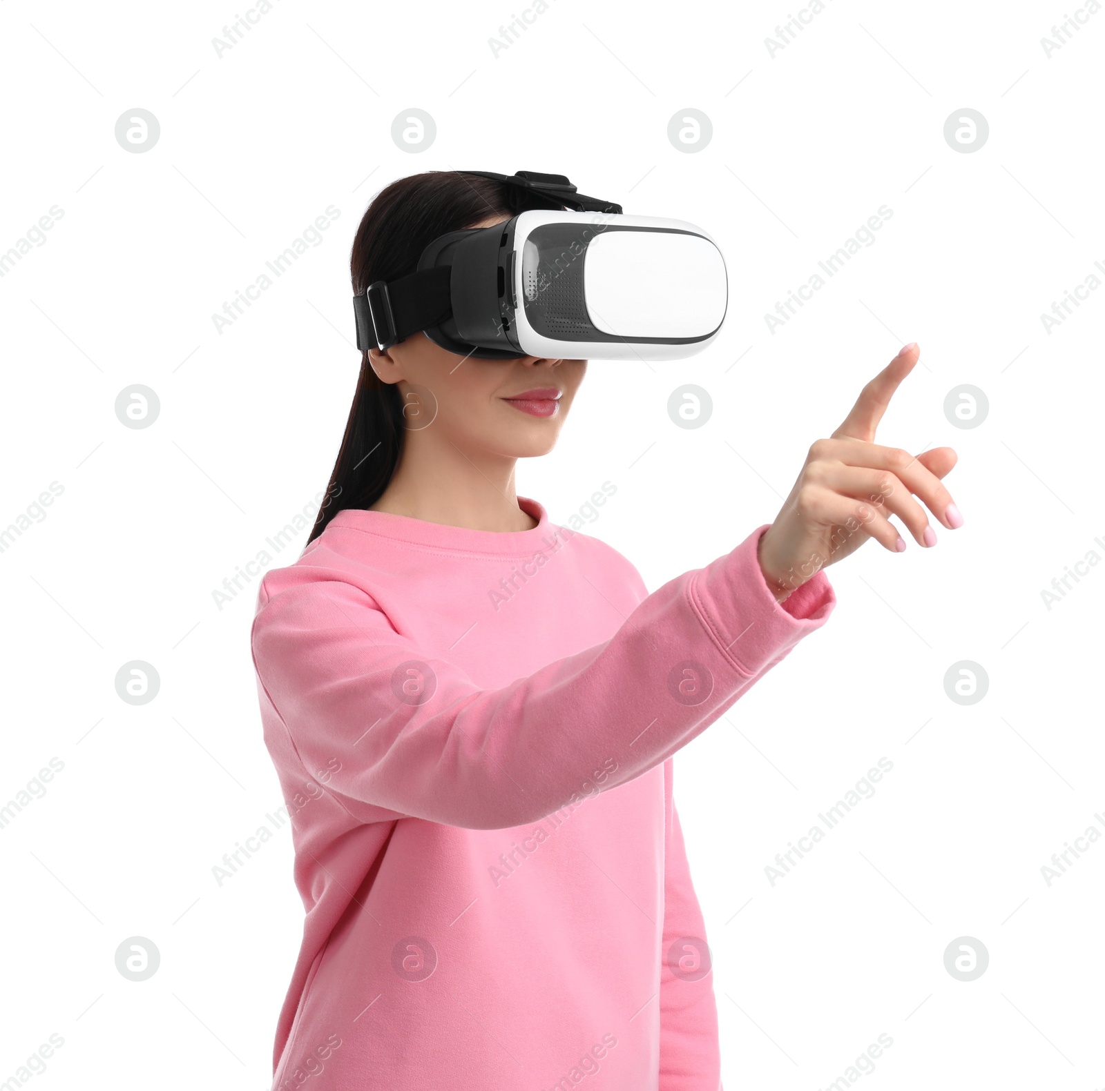 Photo of Woman using virtual reality headset on white background