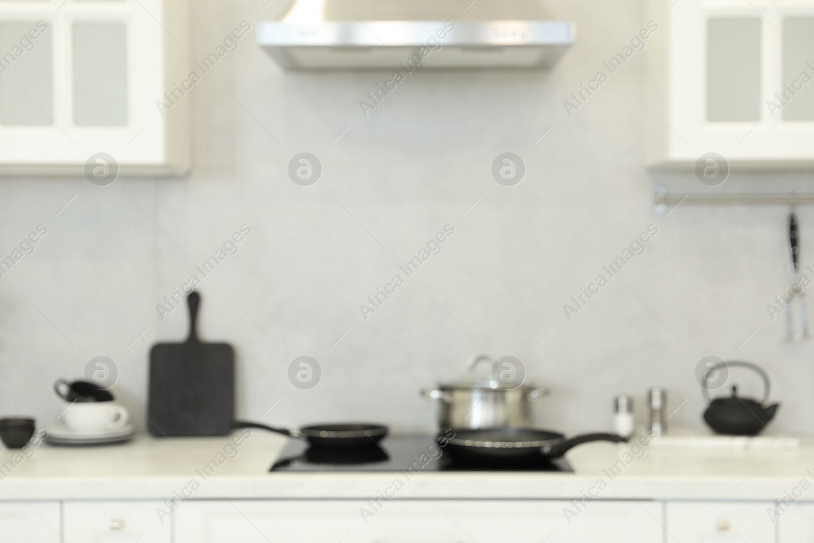 Photo of Blurred view of modern kitchen. Interior design