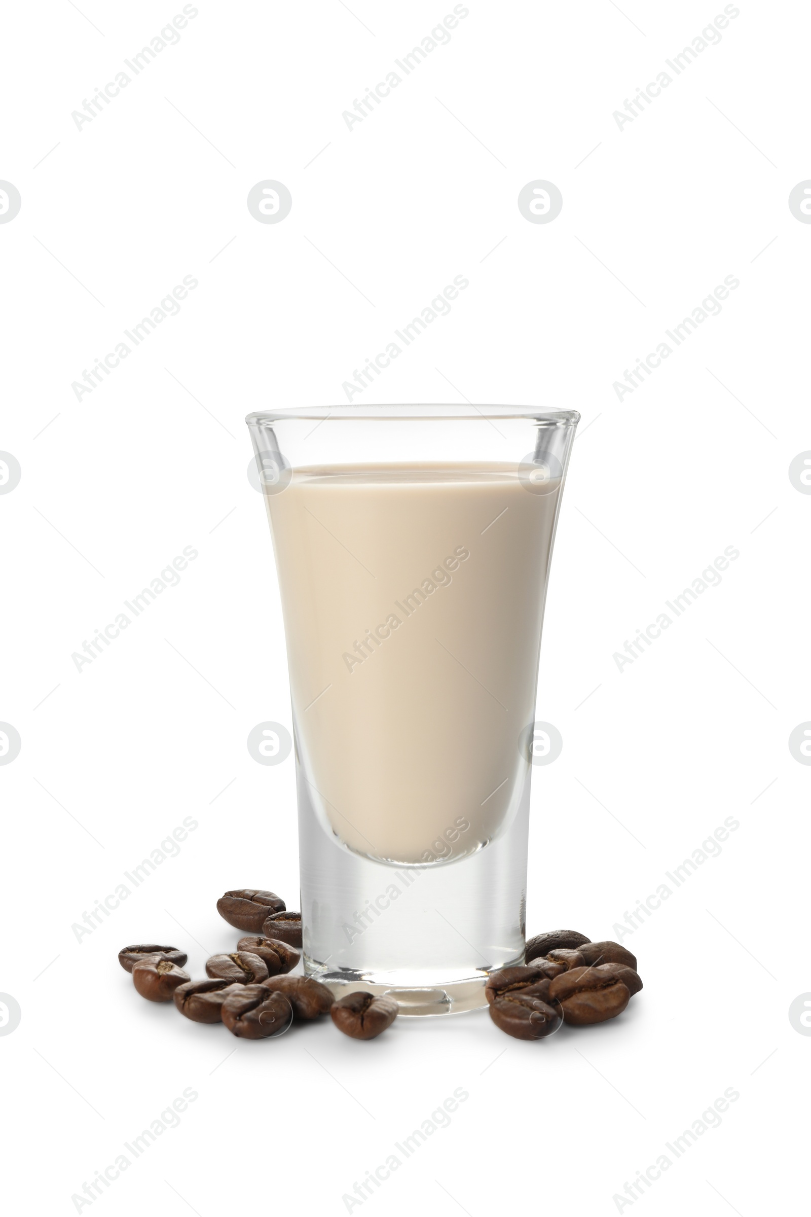 Photo of Glass of coffee cream liqueur and beans isolated on white