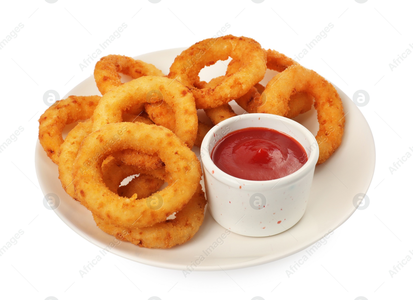 Photo of Plate of tasty fried onion rings with ketchup isolated on white