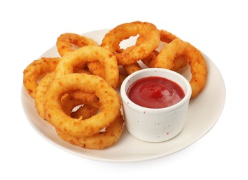 Photo of Plate of tasty fried onion rings with ketchup isolated on white