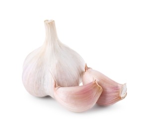 Photo of Head of fresh garlic and cloves isolated on white