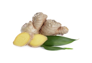 Whole and cut fresh ginger with leaves isolated on white