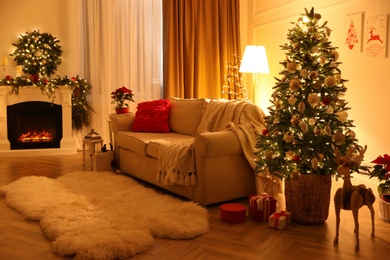 Festive living room interior with Christmas tree and fireplace