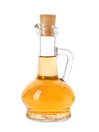 Photo of Glass jug of apple vinegar on white background