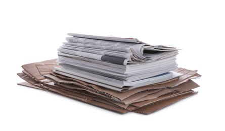 Photo of Stack of cardboard and newspapers on white background. Recycling rubbish