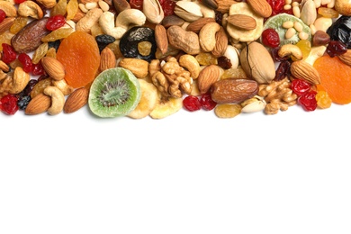 Photo of Different dried fruits and nuts on white background, top view. Space for text