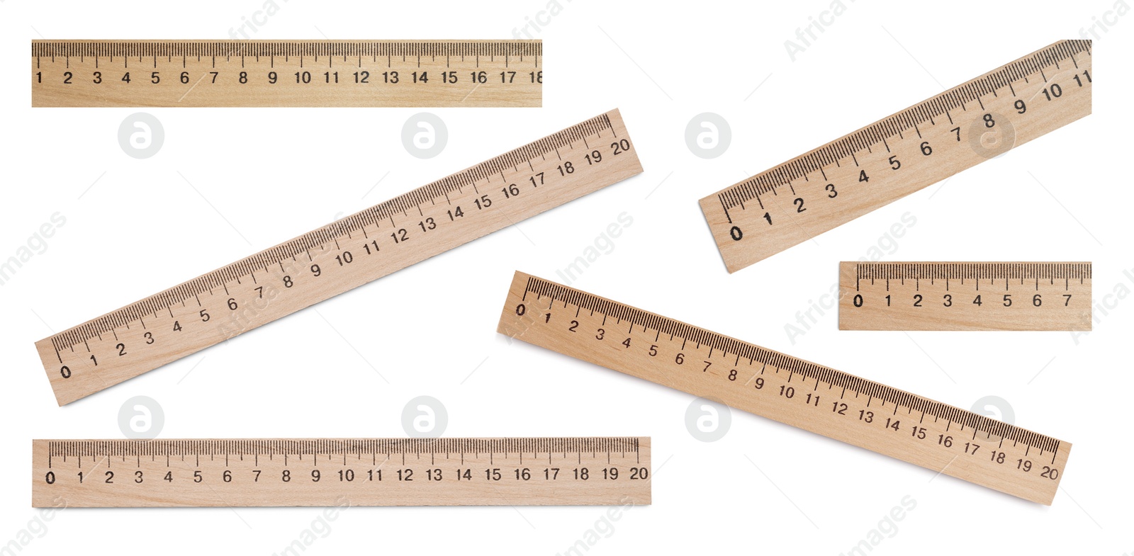 Image of Set with different rulers with measuring length markings in centimeters on white background