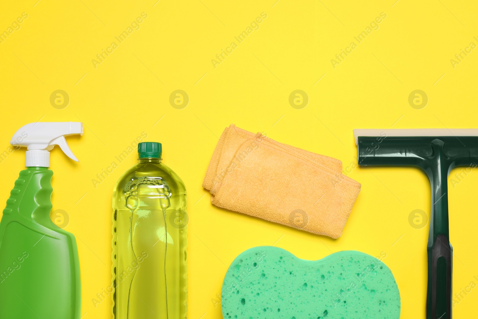 Photo of Different car products on yellow background, flat lay. Space for text