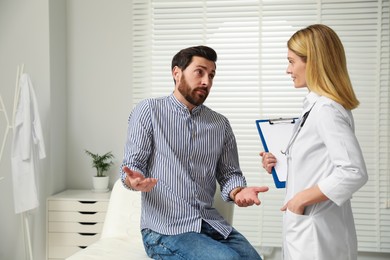 Patient having appointment with doctor in clinic