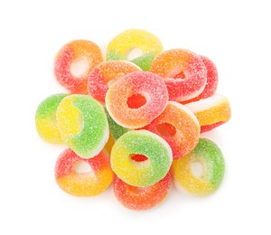 Pile of tasty colorful jelly candies on white background, top view