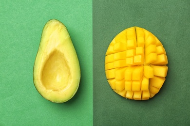 Photo of Flat lay composition with ripe avocado and mango on color background