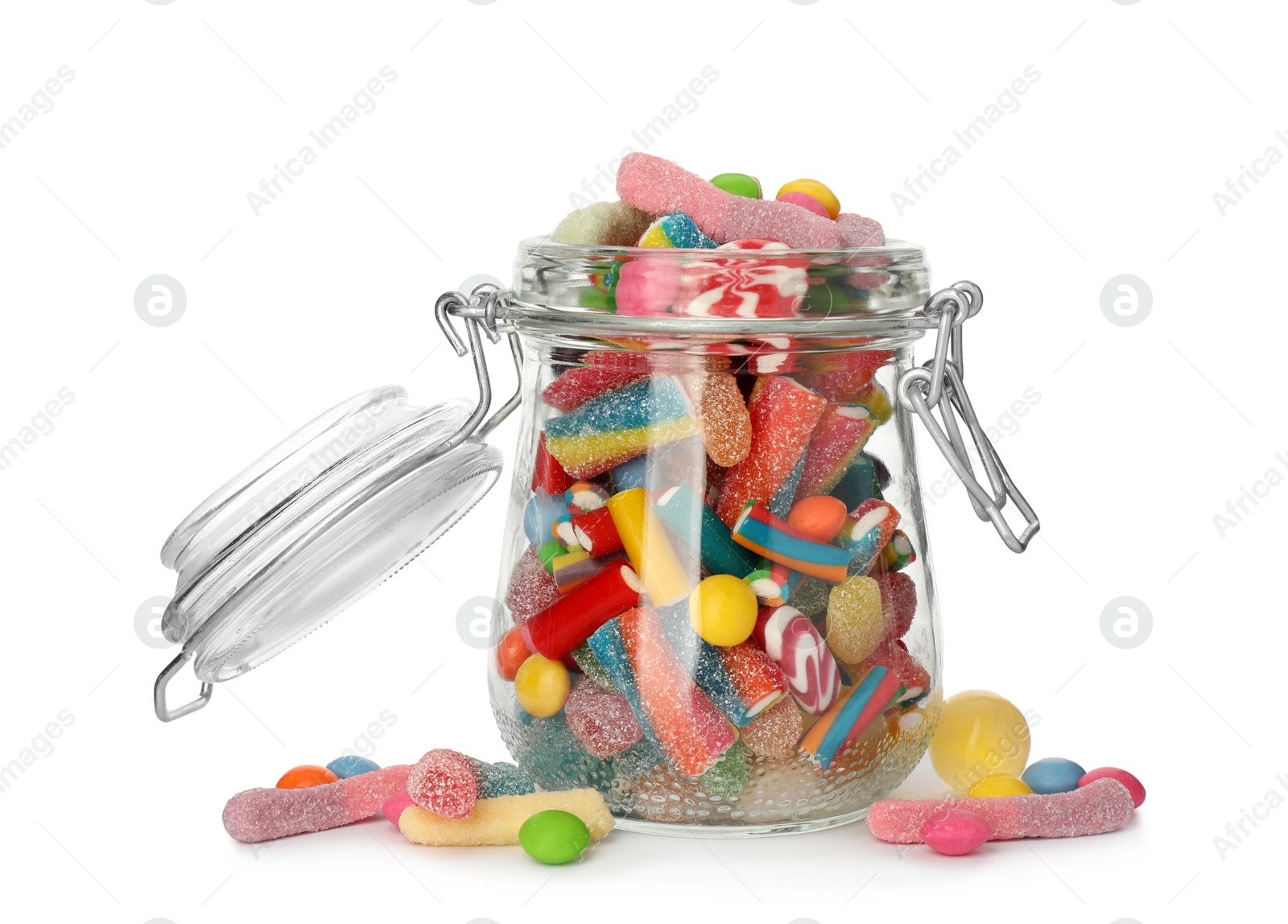 Photo of Glass jar with different candies on white background