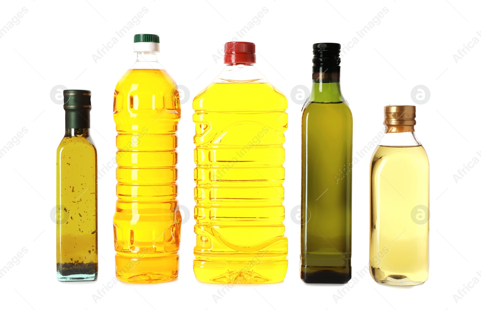 Photo of Bottles with different oils on white background