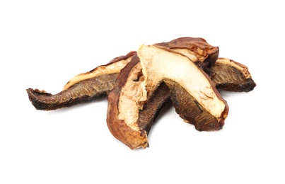 Slices of dried mushrooms on white background