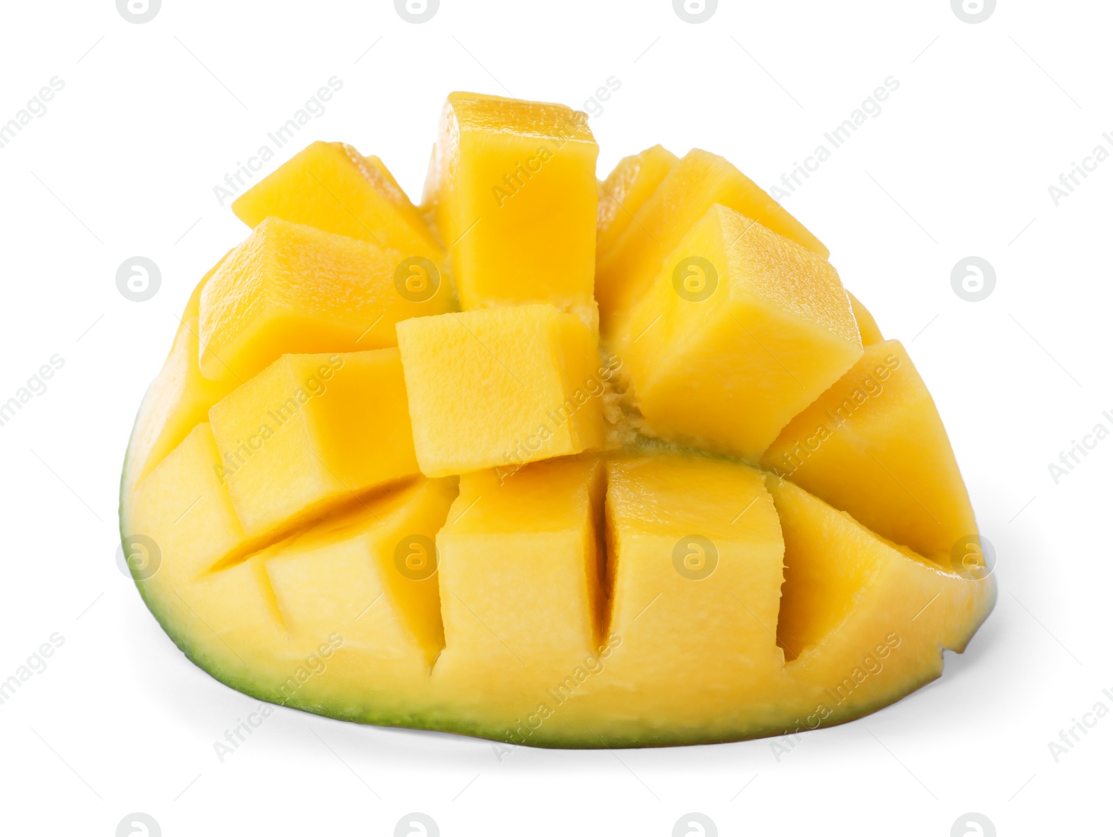 Photo of Half of ripe mango cut into cubes isolated on white