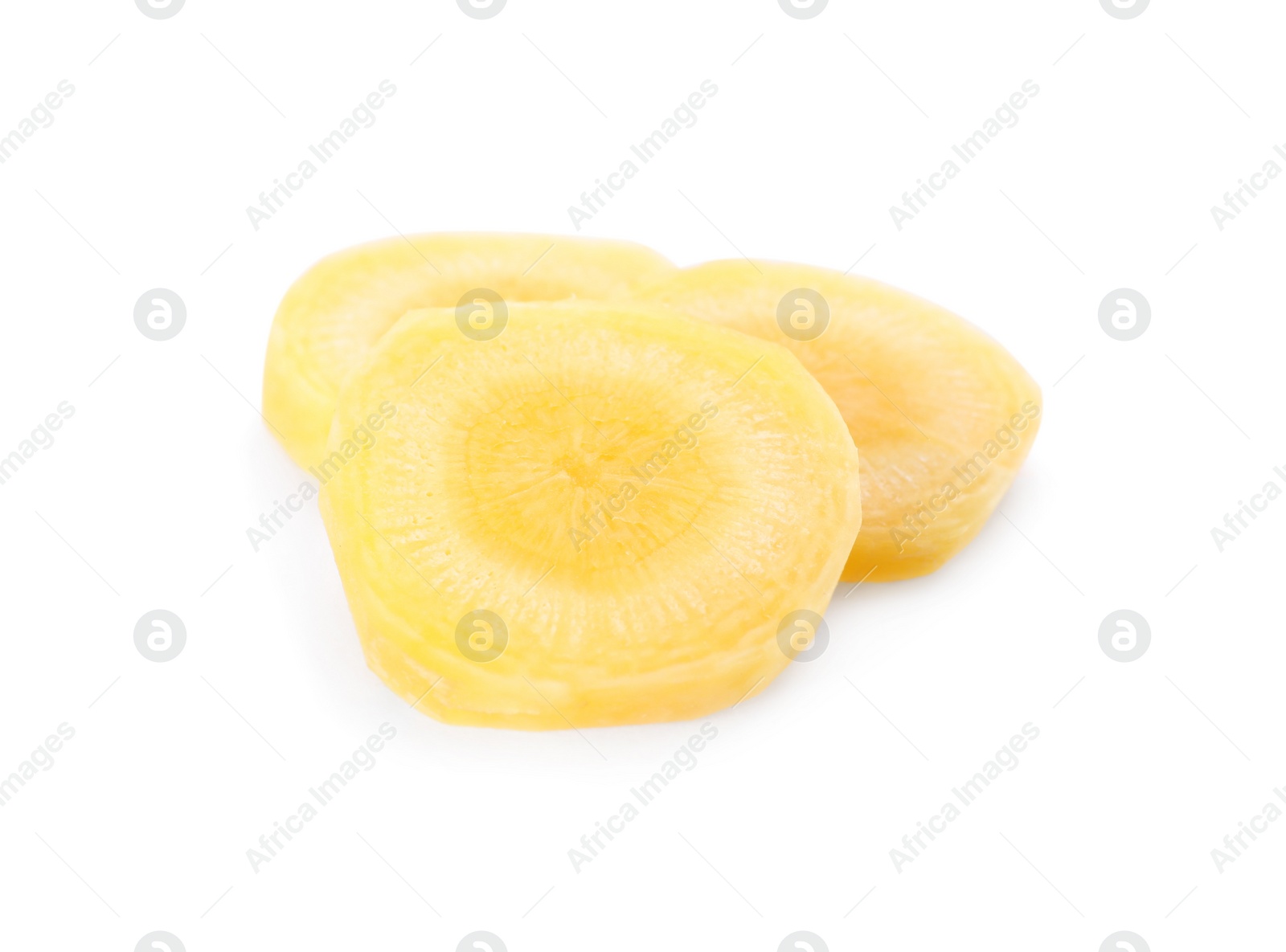 Photo of Slices of raw yellow carrot isolated on white