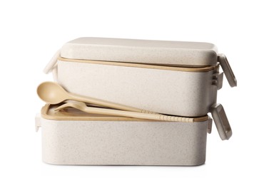 Eco friendly lunch boxes with cutlery on white background. Conscious consumption