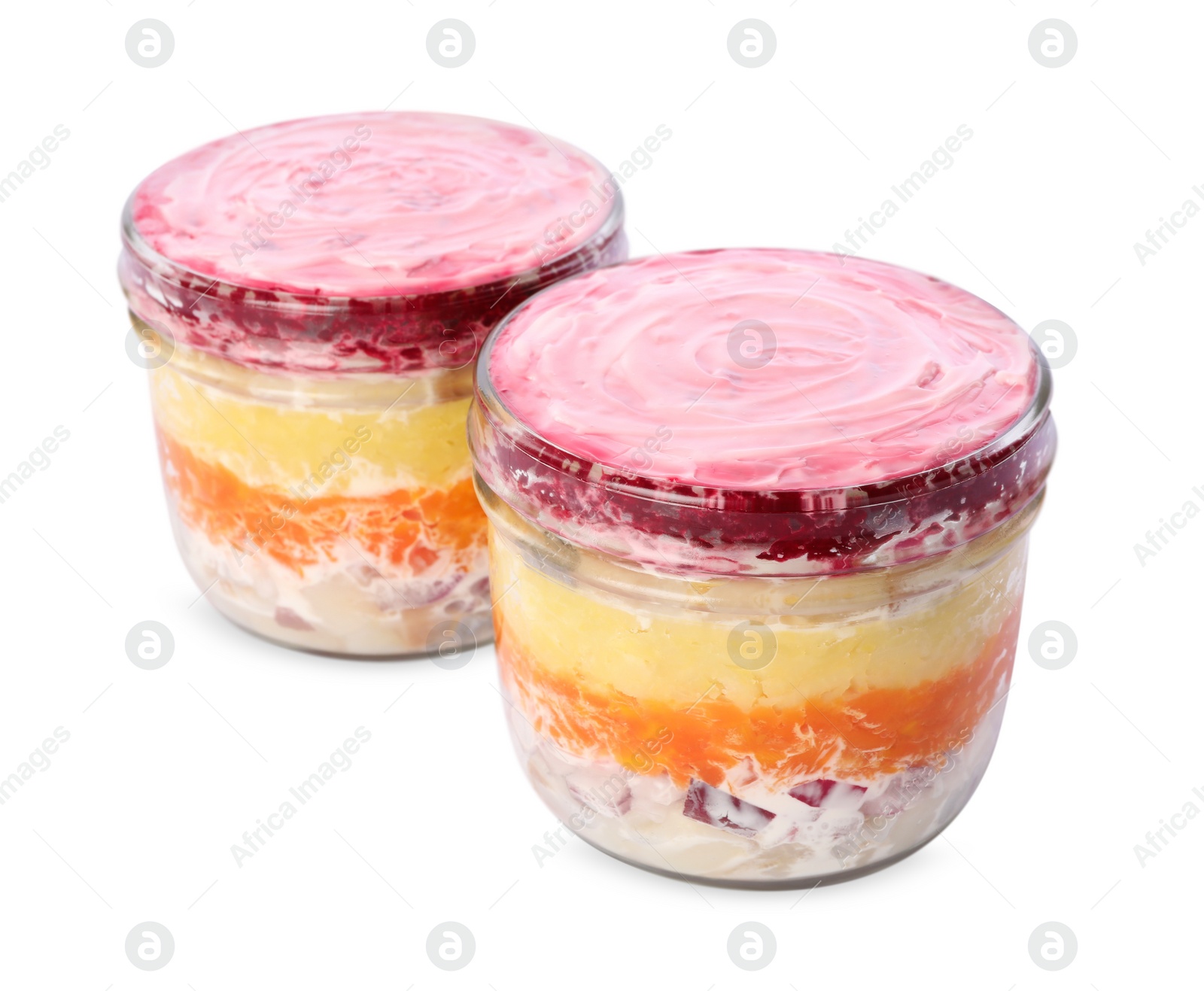 Photo of Jars with herring under fur coat isolated on white. Traditional Russian salad