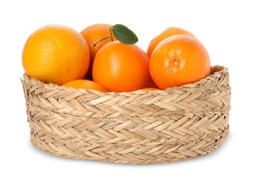 Fresh oranges in wicker basket isolated on white