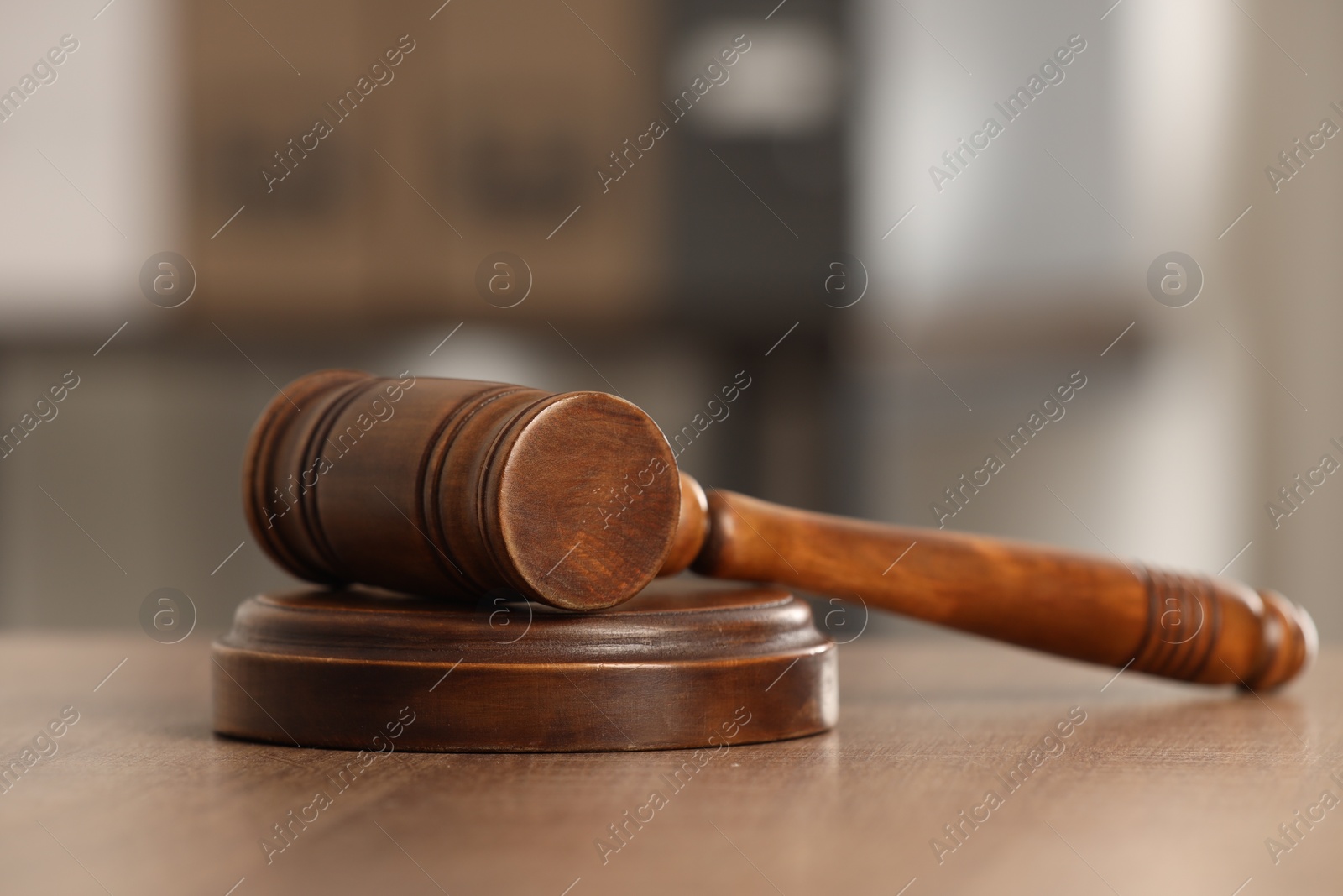 Photo of Law concept. Gavel on wooden table, closeup