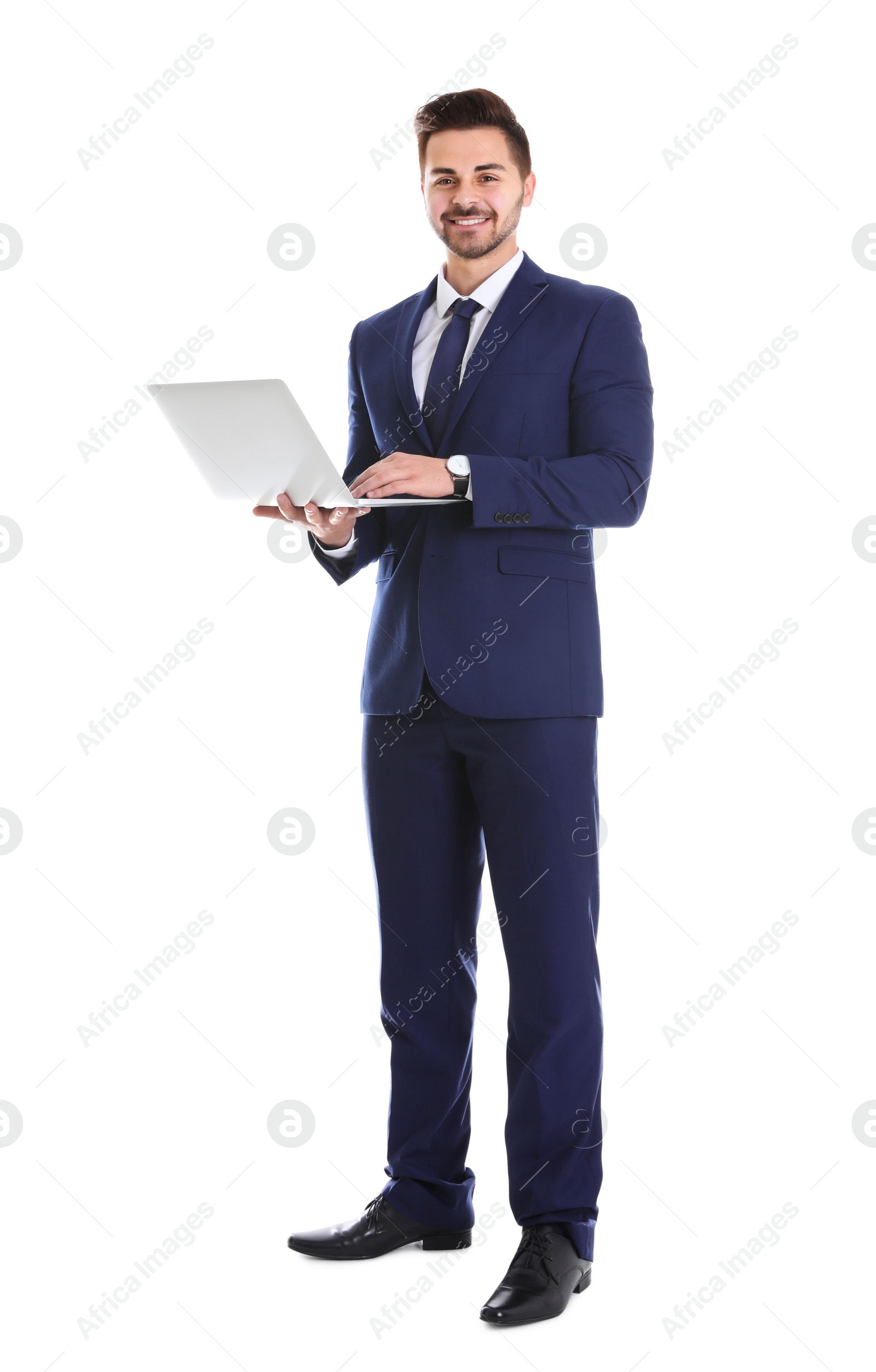 Photo of Young man with laptop on white background