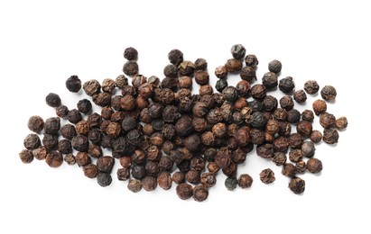 Photo of Aromatic spice. Many black dry peppercorns isolated on white, top view