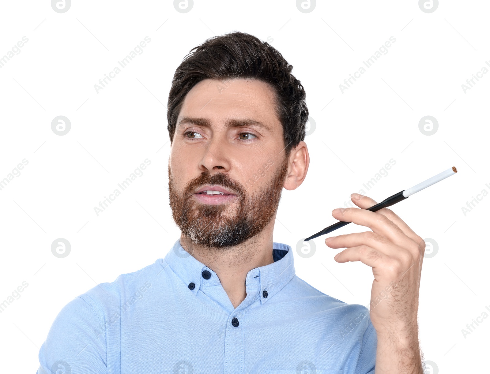 Photo of Man using long cigarette holder for smoking isolated on white