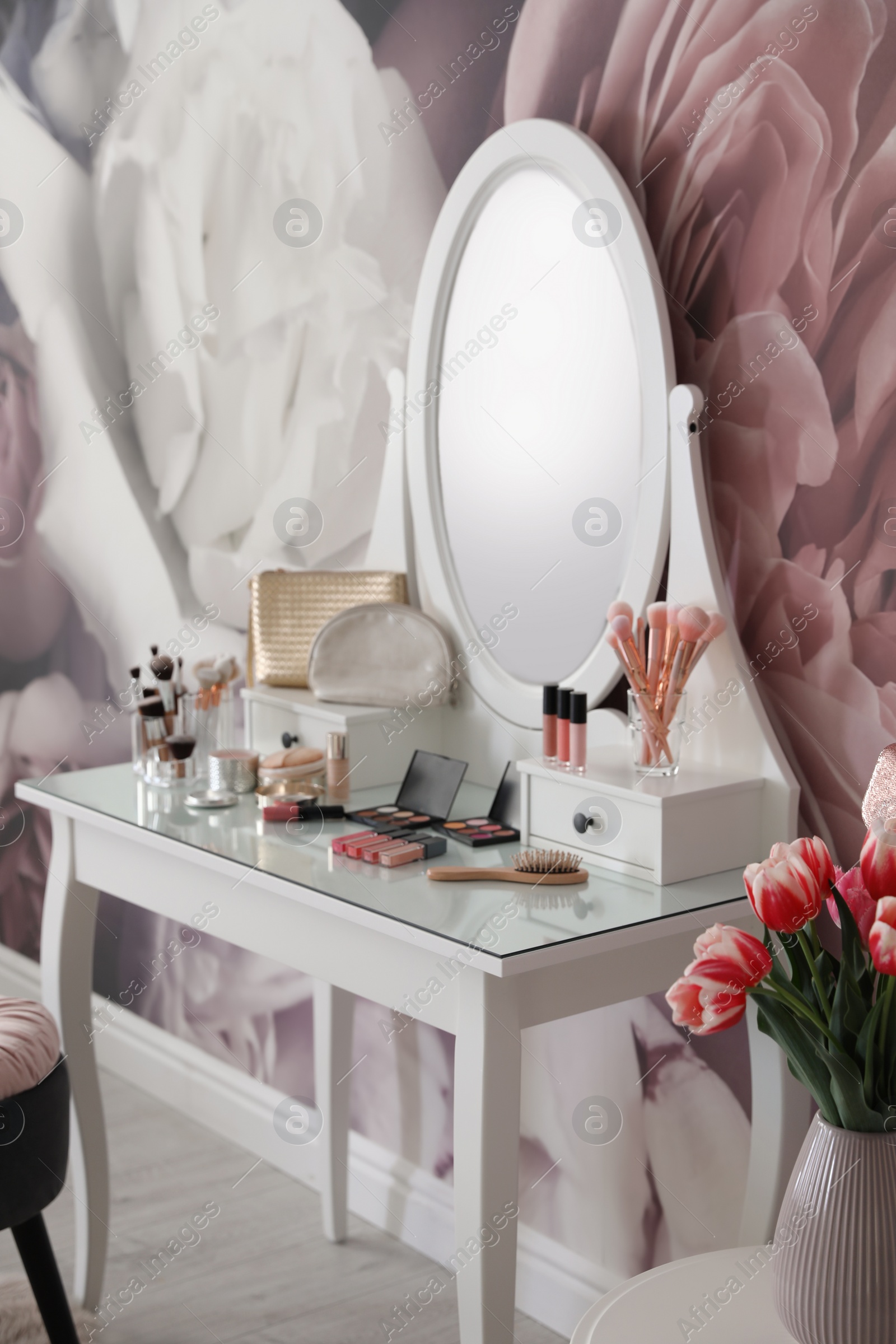 Photo of Stylish room interior with elegant dressing table and floral wallpaper