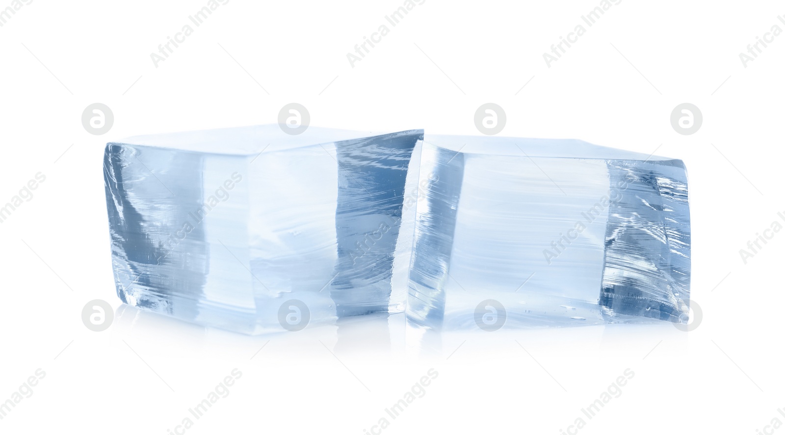 Photo of Crystal clear ice cubes on white background