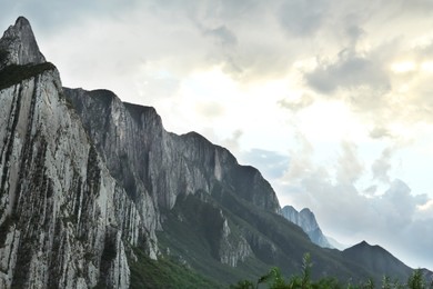 Photo of Picturesque landscape with high mountains under gloomy sky outdoors