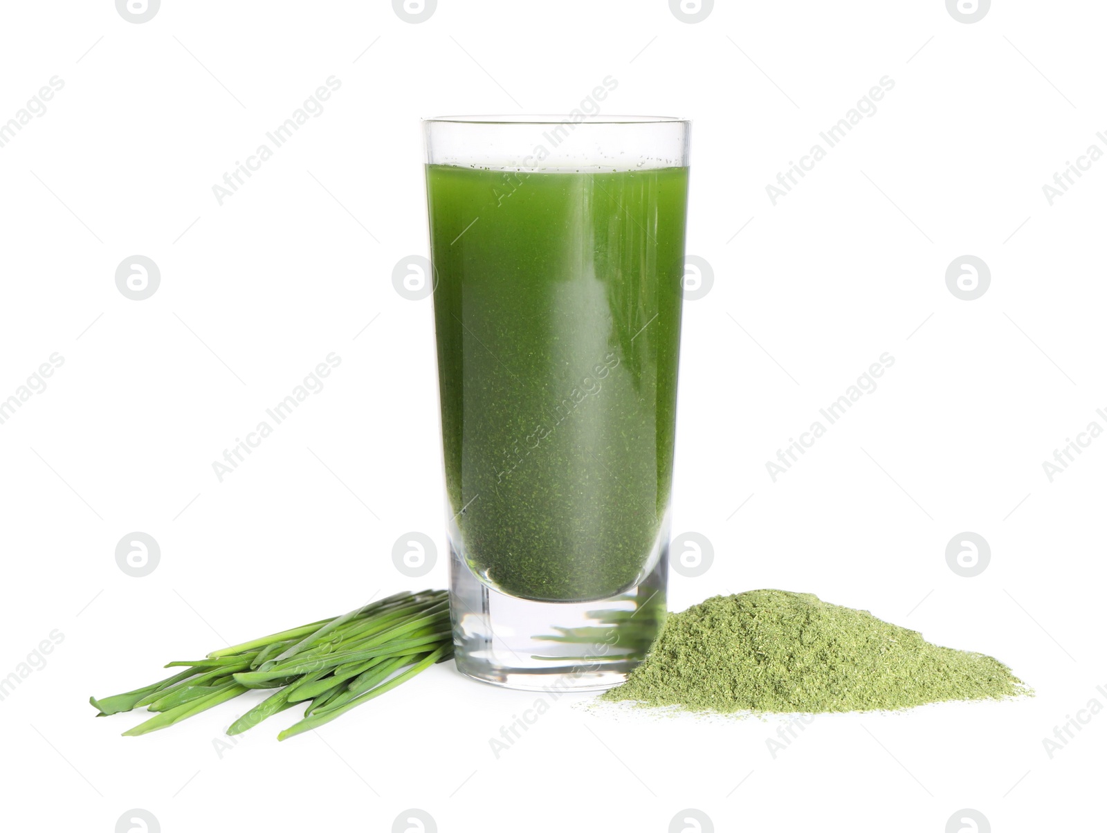 Photo of Wheat grass drink in shot glass, fresh sprouts and green powder isolated on white